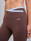 Calza Deportiva Mujer 7/8 Pretina Cruzada Bicolor Chocolate Celeste