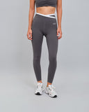 Calza Deportiva Mujer 7/8 Pretina Cruzada Bicolor Gris Blanco